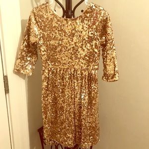 Girls’ gold sequined dress